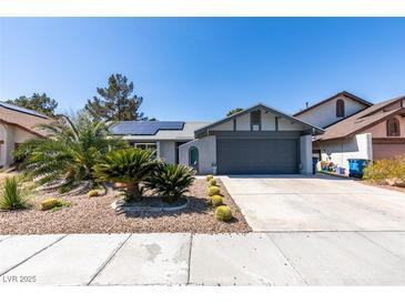 Charming single-story home featuring desert landscaping, solar panels and a spacious two-car garage at 4731 Torrence Dr, Las Vegas, NV 89103