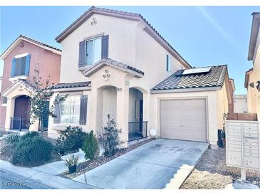 Charming two-story home featuring desert landscaping and a covered front porch, plus an attached garage at 6819 Mahogany Meadows Ave, Las Vegas, NV 89122