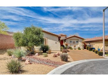 Charming single-story home with desert landscaping, inviting curb appeal, and a circular driveway at 11342 Early Sun Ct, Las Vegas, NV 89135
