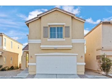 Charming two-story home featuring a well-maintained facade and a spacious two-car garage at 9543 Havasu Canyon Ave, Las Vegas, NV 89166
