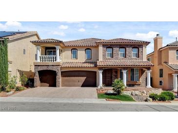 Charming two-story home with a landscaped yard and a three-car garage at 6236 Mount Palomar Ave, Las Vegas, NV 89139