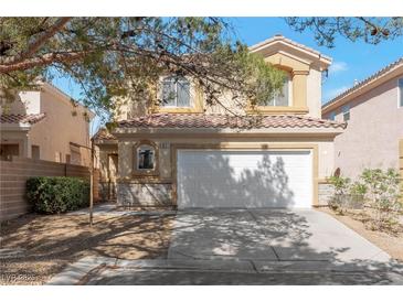 Charming two-story home featuring a well-maintained yard and a two-car garage at 91 Bowler Springs St, Las Vegas, NV 89148
