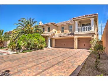 Stunning two-story home with a tile roof, dual garage, and immaculate landscaping at 8454 Mondavi Hill Ct, Las Vegas, NV 89139