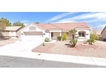 Charming single-story home with a desert landscaped front yard and a red tile roof at 8508 Glenmore Dr, Las Vegas, NV 89134
