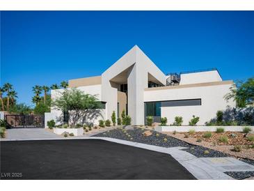 Modern two-story home featuring unique architecture and desert landscaping at 2655 Juniper Branch St, Las Vegas, NV 89117