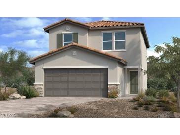 Charming two-story home with a neutral color palette, a tile roof, and a two-car garage at 9548 Hinson St, Las Vegas, NV 89139