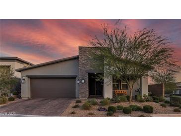 Charming single-story home with desert landscaping and a modern stone accent wall at 109 Reverie Heights Ave, Henderson, NV 89011