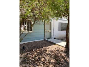 Charming single-Gathering home with well-maintained front yard with secure door at 158 Greenbriar Townhouse Way, Las Vegas, NV 89121