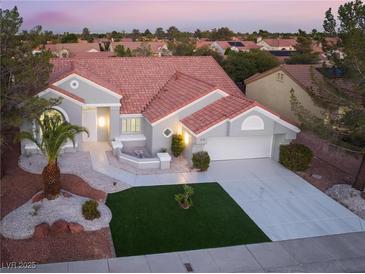 Charming single-story home featuring a desert landscaped yard and a neutral color palette at 2528 Sunup Dr, Las Vegas, NV 89134