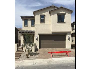 Charming two-story home with a two car garage and lovely desert landscaping at 96 Via Franello, Henderson, NV 89011