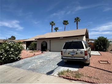 Charming single-story home featuring a desert-landscaped front yard and attached two-car garage at 4244 Gibraltar St, Las Vegas, NV 89121