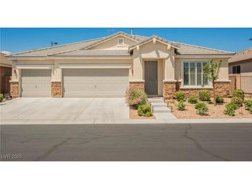 Charming single-story home featuring a three-car garage and well-maintained landscaping at 7119 Saddle Back Peak St, Las Vegas, NV 89166
