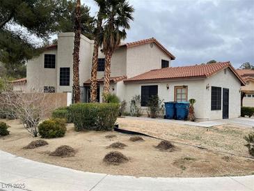 Charming two-story home with desert landscaping and a stucco exterior at 3821 Dream St, Las Vegas, NV 89108