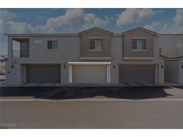 Attached two-car garage providing convenient parking and storage space in a modern home at 4566 Mansart Ct # 1104, North Las Vegas, NV 89031