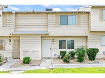 Charming townhome featuring a private entrance and well-maintained front yard landscaping at 4920 Larkspur St, Las Vegas, NV 89120