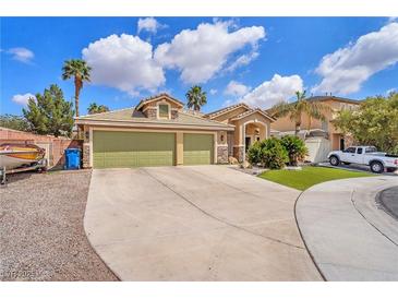 Charming single-story home features a well-manicured lawn, spacious driveway, and a three-car garage in a desirable location at 4878 Friar Tuck Ave, Las Vegas, NV 89130