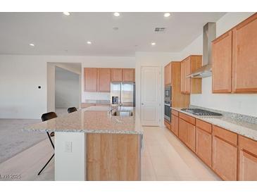 Bright eat-in kitchen features stainless appliances and granite countertops at 80 Brixton Ave, Henderson, NV 89011
