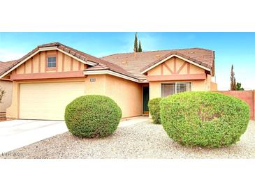 Charming single-story home with a tidy front yard and well-maintained landscaping with drought tolerant desert scape at 8120 Backpacker Ct, Las Vegas, NV 89131