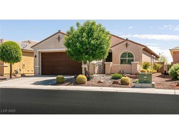 Charming single-story home with desert landscaping, covered entrance and two car garage at 8180 Loma Del Ray St, Las Vegas, NV 89131