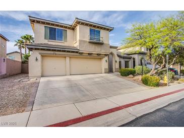 Charming two-story home with a spacious driveway and a two-car garage, complemented by a well-maintained front yard at 9052 Pine Mission Ave, Las Vegas, NV 89143