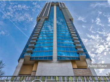 Striking, modern Palms Place high-rise building against a vibrant blue sky at 4381 W Flamingo Rd # 1109, Las Vegas, NV 89103