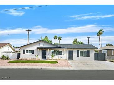 Charming single-story home with a minimalist front yard and desert landscaping at 3124 Glenhurst Dr, Las Vegas, NV 89121