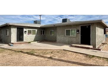 A well-maintained, one-story building exterior features a flat roof and functional design at 1651 Cadillac Ln, Las Vegas, NV 89106
