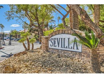 Sevilla community sign surrounded by lush landscaping, offering a welcoming entrance and serene environment at 3135 S Mojave Rd # 146, Las Vegas, NV 89121