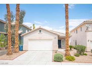Charming single-story home with a well-maintained front yard and two-car garage in a desirable location at 8564 Lost Gold Ave, Las Vegas, NV 89129