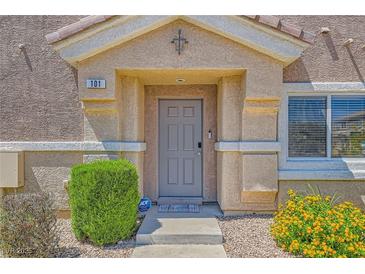 Charming front entrance with well-maintained landscaping and a secure ADT system for peace of mind at 5536 Baccarat Ave # 101, Las Vegas, NV 89122