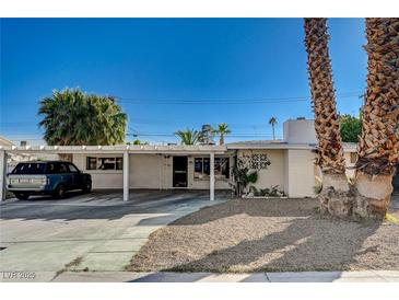 Charming single-story home with a covered carport and desert landscaping in a bright, sunny neighborhood at 2325 Sombrero Dr, Las Vegas, NV 89169