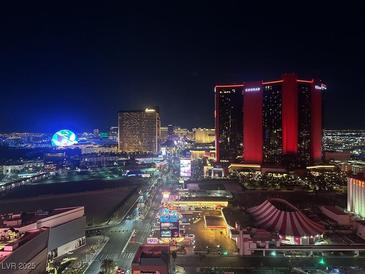 Bright night cityscape view showing hotels, casinos, and city lights at 2700 Las Vegas Blvd # 2809, Las Vegas, NV 89109