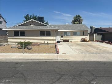 Charming single-story home with a spacious driveway and a low-maintenance front yard at 5424 Del Rey Ave, Las Vegas, NV 89146
