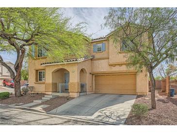 Inviting two-story home featuring desert landscaping and a two-car garage at 2714 Cottonwillow St, Las Vegas, NV 89135