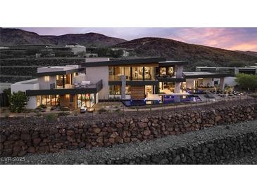 Luxury home boasts a modern design with a pool and mountain views at 6 Vista Crescent Ct, Henderson, NV 89012