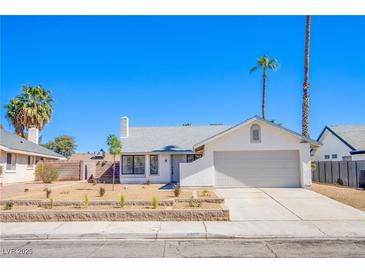 Charming single-story home featuring a two-car garage and low-maintenance desert landscaping at 3118 Floral Vista Ave, Henderson, NV 89014