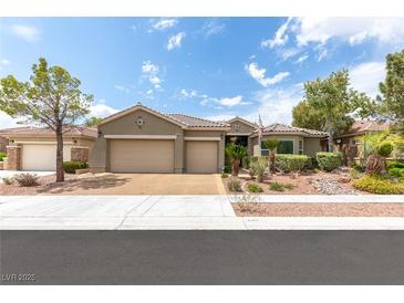 Inviting single-story home featuring a three-car garage and well-manicured front yard at 3483 French Daisy St, Las Vegas, NV 89135