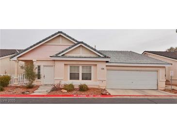 Charming single-story home with a two-car garage and well-maintained landscaping at 5236 Ladyhawk Way, Las Vegas, NV 89118