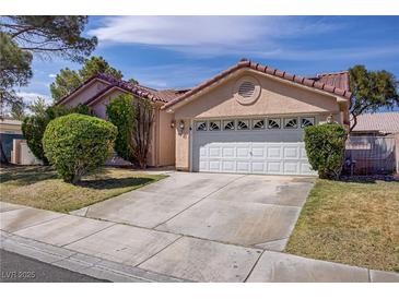 Charming single-story home featuring a two-car garage and well-maintained landscaping at 6332 Sierra Pines Ct, Las Vegas, NV 89130