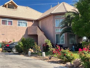 Charming two-story home with a tile roof and well-maintained landscaping at 3984 Royal Viking Way, Las Vegas, NV 89121
