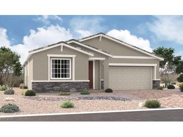 Charming single-story home featuring stone accents, neutral stucco and a two car garage at 10265 Tumbaga St, Las Vegas, NV 89183