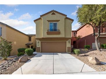 Inviting two-story home with a well-maintained front yard and a two-car garage at 10617 Tuckermans Ave, Las Vegas, NV 89129
