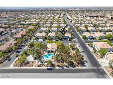 A lush community with a swimming pool and clubhouse at 7985 Simone Ave, Las Vegas, NV at 7985 Simone Ave, Las Vegas, NV 89147