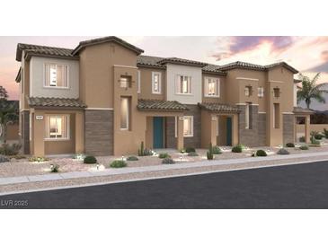 Charming townhome exteriors featuring stucco facades, tiled roofs, and desert landscaping at 858 Angwin Ln, Henderson, NV 89011