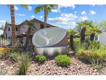 Symphony community sign surrounded by lush desert landscaping at 2606 S Durango Dr # 260, Las Vegas, NV 89117