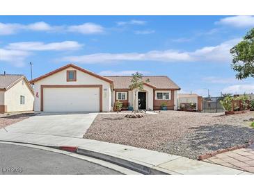 Charming single-story home featuring a well-maintained yard with desert landscaping at 2805 El Cubano Ct, North Las Vegas, NV 89030