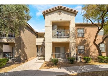 Modern apartment building featuring private balconies and landscaped grounds at 8000 Badura Ave # 1058, Las Vegas, NV 89113