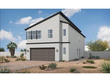 Newly constructed two-story home featuring a gray exterior, dark trim, and a convenient two-car garage at 8124 Beebrush Ct, Las Vegas, NV 89113