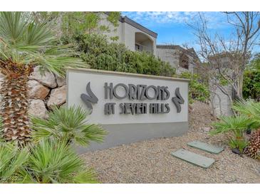 Community sign for Horizons at Seven Hills featuring lush landscaping and attractive building architecture at 950 Seven Hills Dr # 2313, Henderson, NV 89052