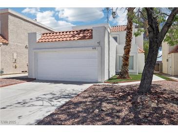 Charming two-story home featuring a large two-car garage and desert landscaping at 3132 Centavo Dr, Las Vegas, NV 89117